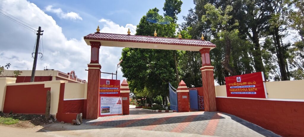 Ramakrishna Math Ooty entrance gate with red pillars and blue gate