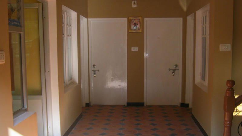Indoor corridor with rooms