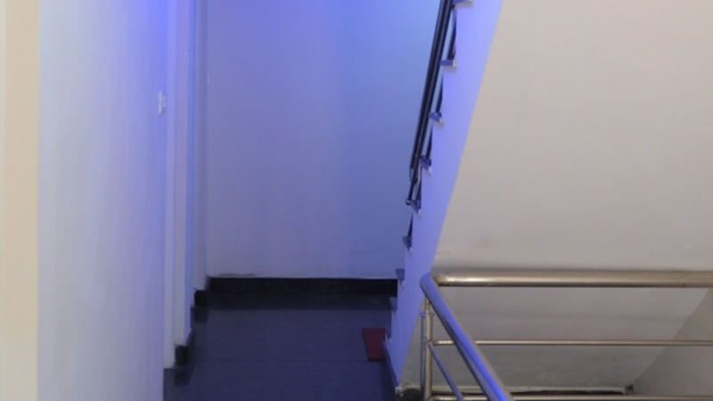 Indoor staircase with handrail
