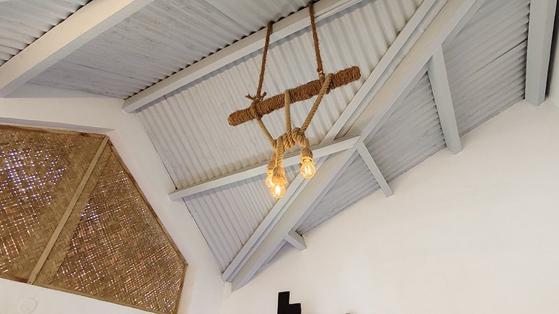 Rustic rope hanging ceiling light with wooden beam roof and modern interior ceiling design