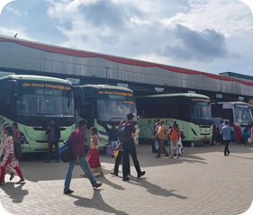Ooty bus stand with TNSTC buses and passengers