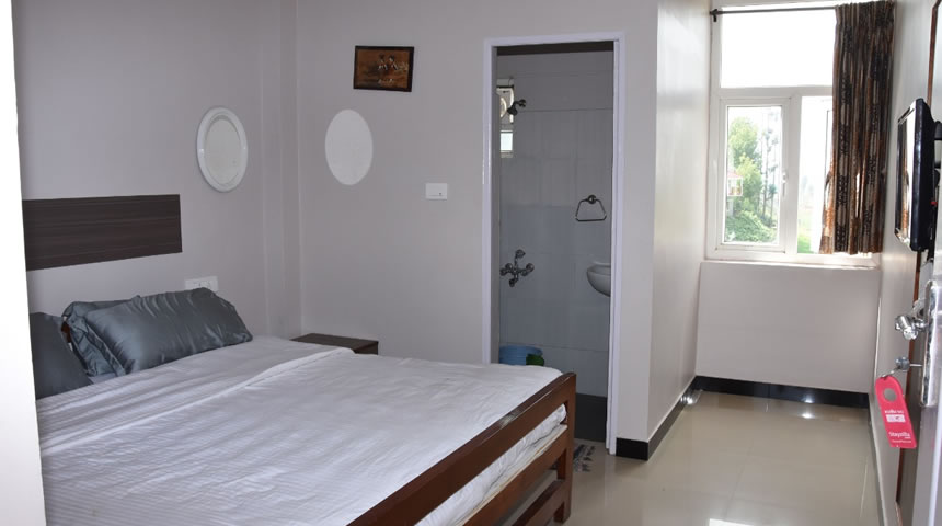 Bedroom with TV at hvn cottage