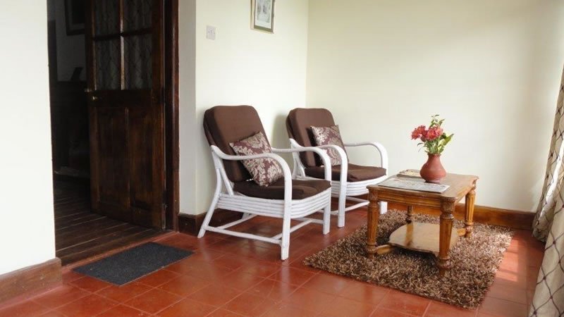 Private sitting area with armchairs