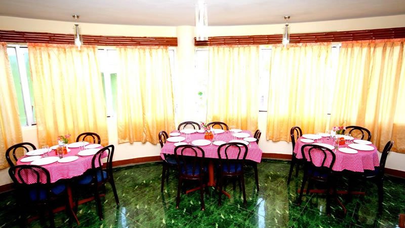 Bright dining hall with tables