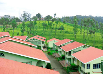 La Flora Resort exterior surrounded by green tea plantations in the hills