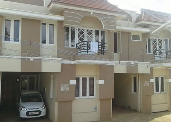 Rajesh Cottage featuring family-friendly rooms with covered parking and balcony access