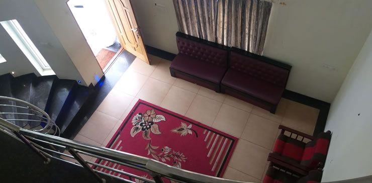 Living room seating area viewed from above at Toy Cottage