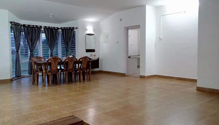 Living hall and dining table at Vivin Cottage