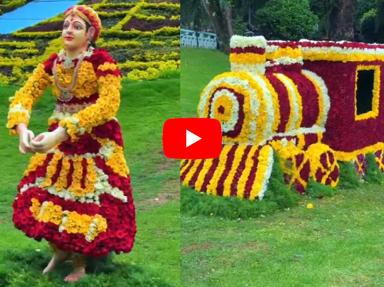 Colorful floral statue and flower train display at Ooty Flower Show in Government Botanical Garden, Ooty